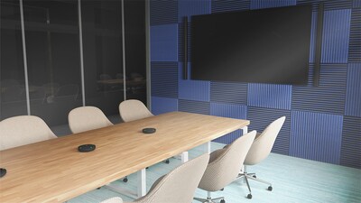 Photo showing a medium-sized conference room equipped with tabletop array microphones